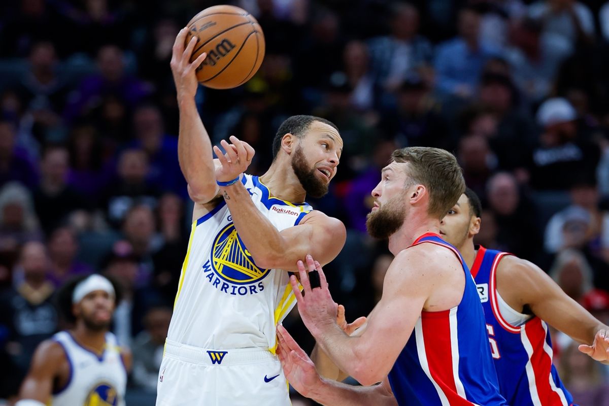 Feb 21, 2025; Sacramento, California, USA; Golden State Warriors guard Stephen Curry (30) passes the ball against Sacramento Kings forward Domantas Sabonis (11) during the second quarter at Golden 1 Center. Mandatory Credit: Sergio Estrada-Imagn Images