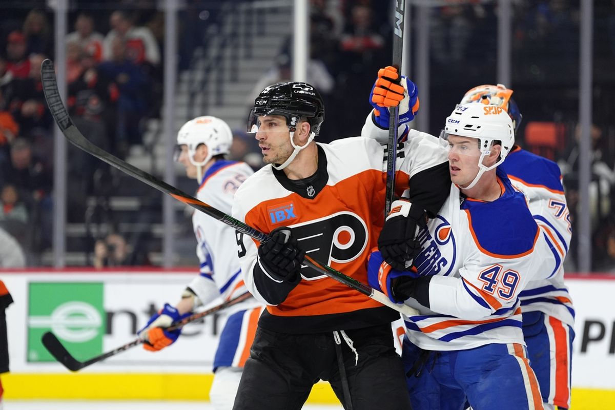 Feb 22, 2025; Philadelphia, Pennsylvania, USA; Philadelphia Flyers right wing Garnet Hathaway (19) and Edmonton Oilers defenseman Ty Emberson (49) battle for position in the first period at Wells Fargo Center. Mandatory Credit: Kyle Ross-Imagn Images
