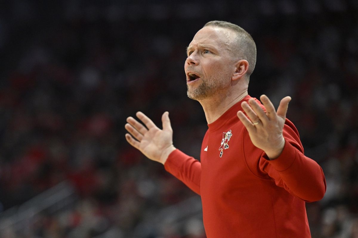 Feb 22, 2025; Louisville, Kentucky, USA;  Louisville Cardinals head coach Pat Kelsey reacts during the first half against the Florida State Seminoles at KFC Yum! Center. Louisville defeated Florida State 89-81. Mandatory Credit: Jamie Rhodes-Imagn Images