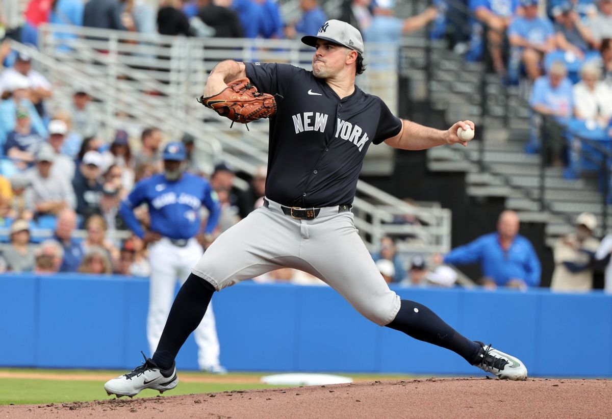 Feb 22, 2025; Dunedin, Florida, USA; New York Yankees pitcher Carlos Rodon (55) throws a pitch against the Toronto Blue Jays during the first inning at TD Ballpark. Mandatory Credit: Kim Klement Neitzel-Imagn Images