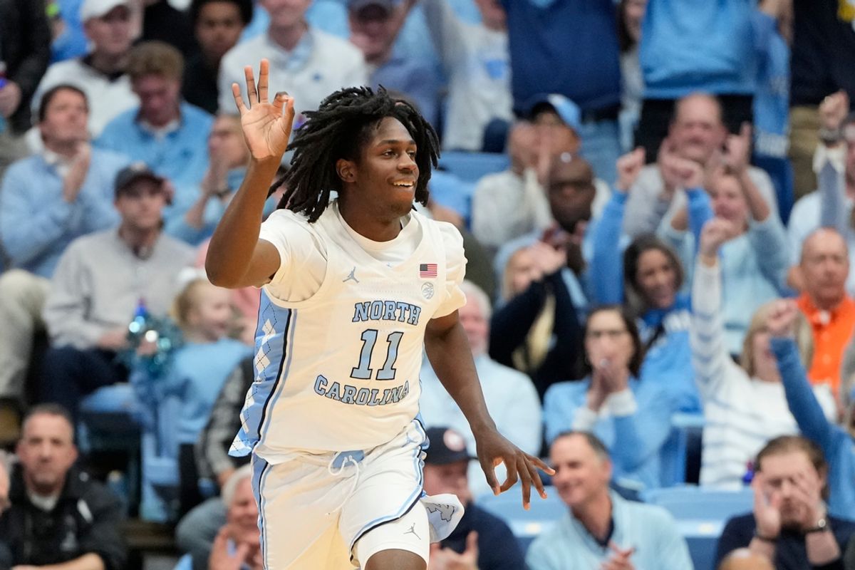 Feb 22, 2025; Chapel Hill, North Carolina, USA; North Carolina Tar Heels guard Ian Jackson (11) reacts after hitting a three point shot in the first half at Dean E. Smith Center. Mandatory Credit: Bob Donnan-Imagn Images
