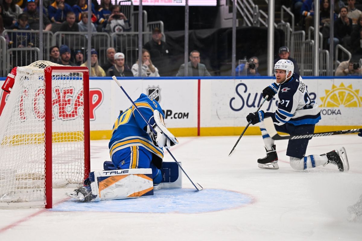 Feb 22, 2025; St. Louis, Missouri, USA; Winnipeg Jets left wing Nikolaj Ehlers (27) scores a goal against the St. Louis Blues during the first period at Enterprise Center. Mandatory Credit: Connor Hamilton-Imagn Images
