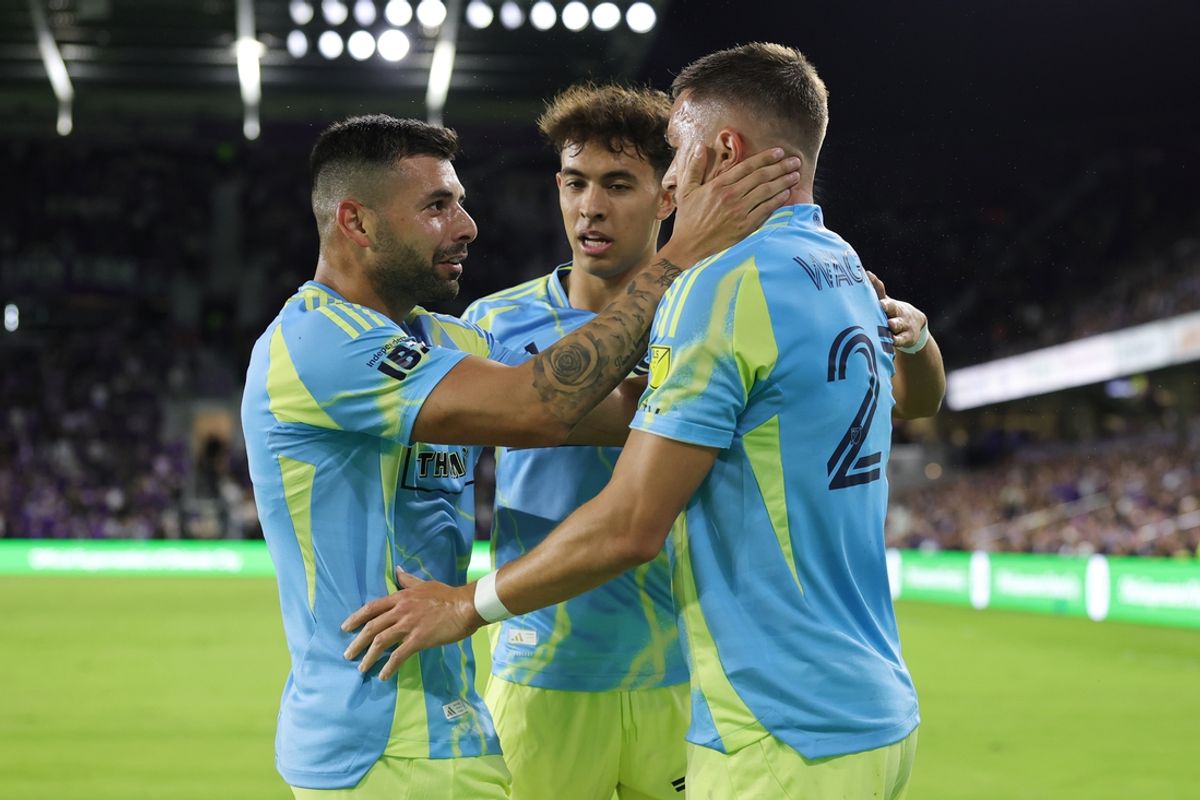 Feb 22, 2025; Orlando, Florida, USA; Philadelphia Union forward Tai Baribo (9) celebrates with defender Kai Wagner (27) and midfielder Quinn Sullivan (33) after scoring a goal against Orlando City in the first half at Inter&Co Stadium. Mandatory Credit: Mike Watters-Imagn Images