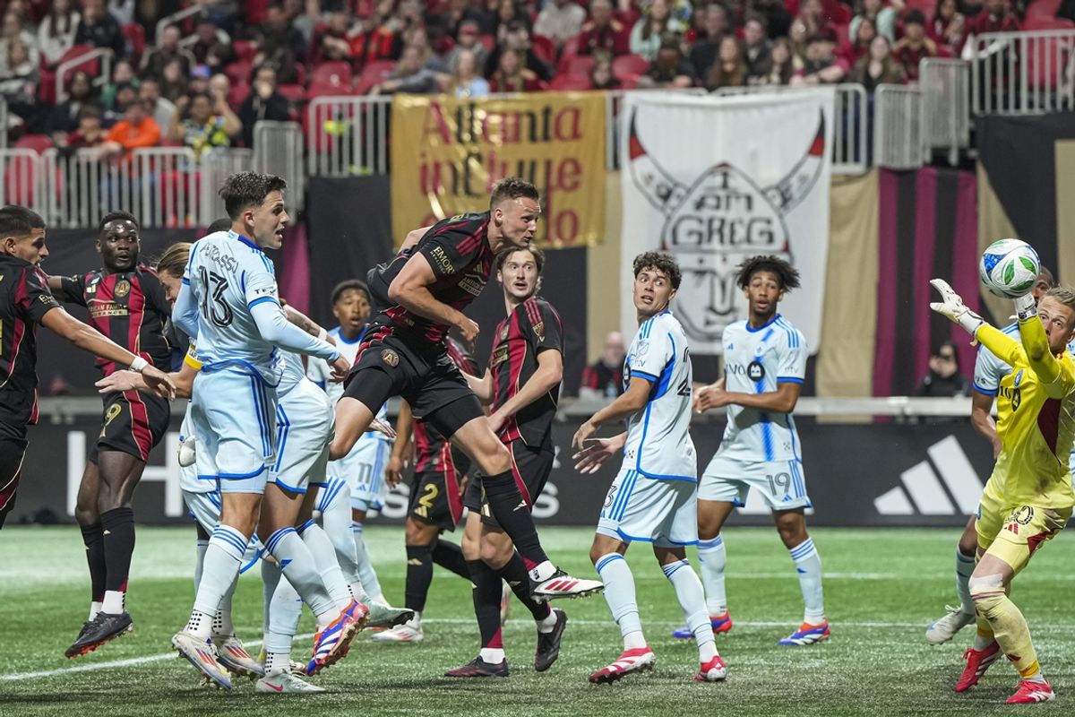 Feb 22, 2025; Atlanta, Georgia, USA; Atlanta United forward Emmanuel Latte Lath (19) scores a goal on a header off a corner kick against CF Montreal during the first half at Mercedes-Benz Stadium. Mandatory Credit: Dale Zanine-Imagn Images