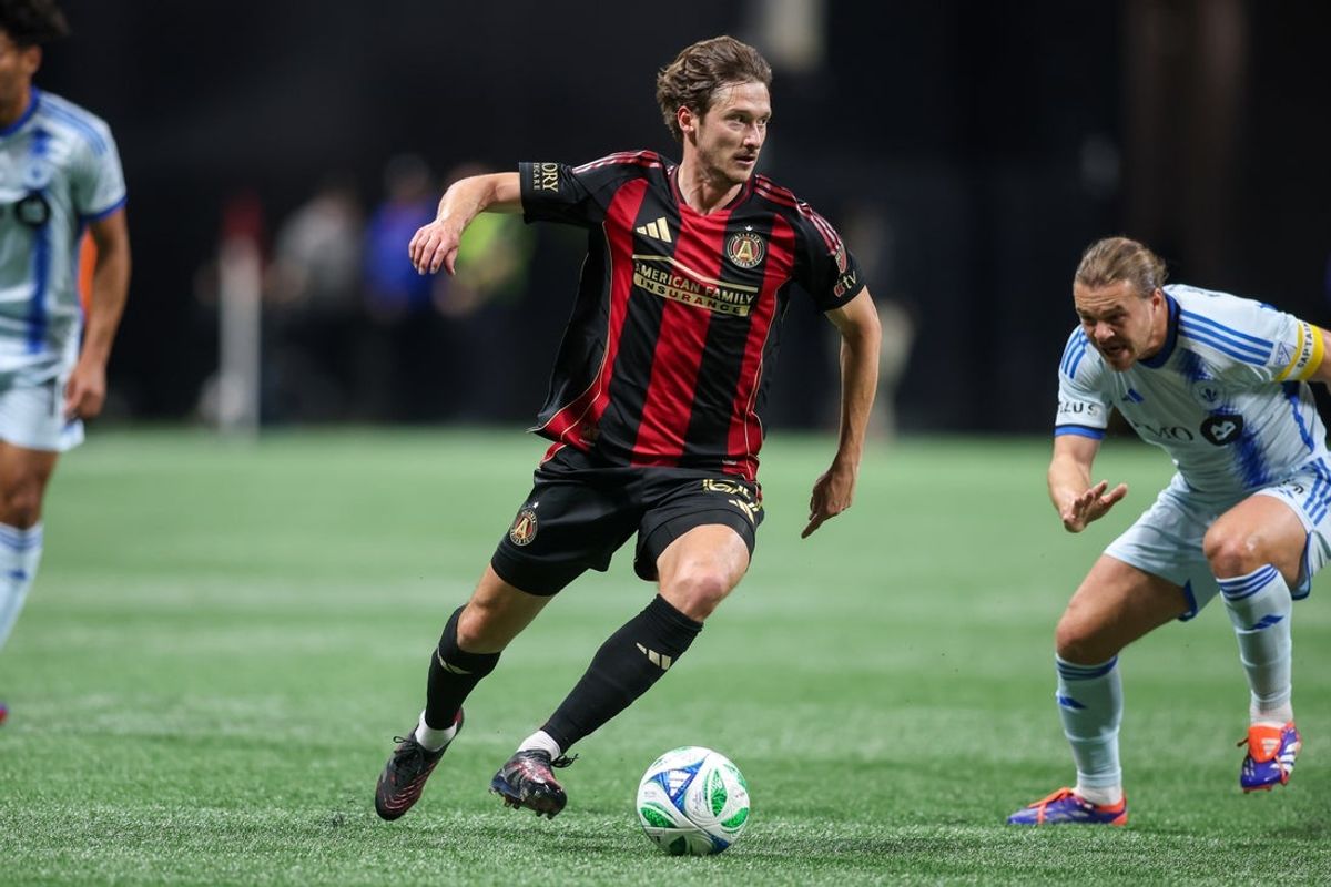 Feb 22, 2025; Atlanta, Georgia, USA; Atlanta United midfielder Alexey Miranchuk (59) handles the ball against CF Montreal in the first half at Mercedes-Benz Stadium. Mandatory Credit: Brett Davis-Imagn Images