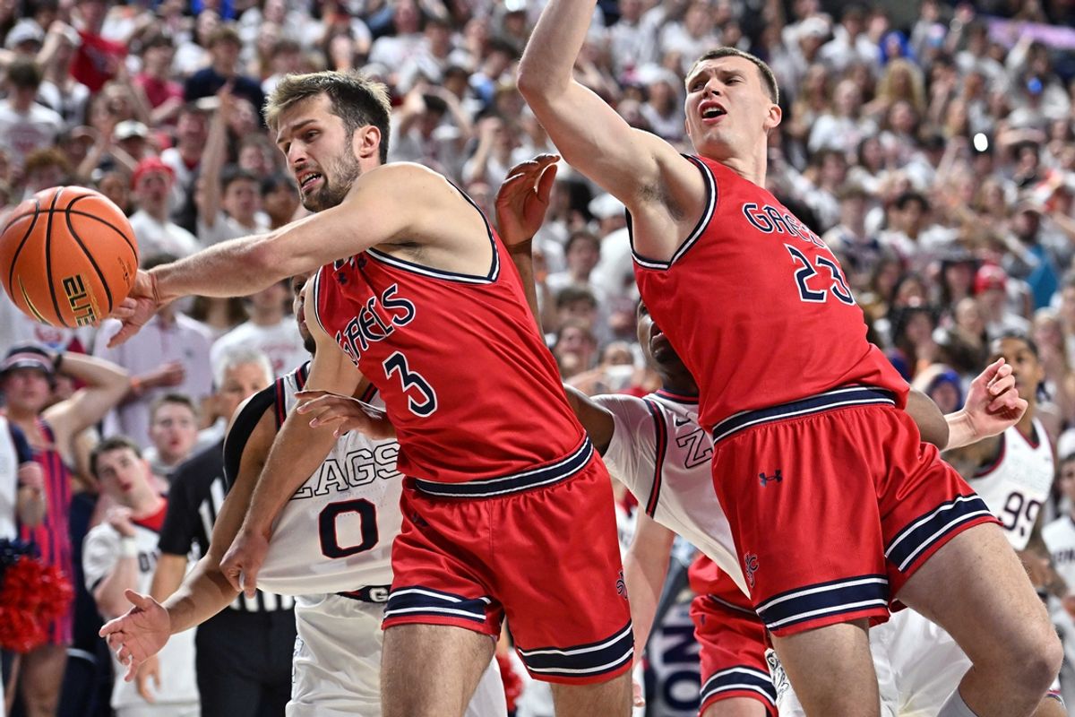 Feb 22, 2025; Spokane, Washington, USA; St. Mary's Gaels guard Augustas Marciulionis (3) fights for the rebound against Gonzaga Bulldogs guard Ryan Nembhard (0) in the first half at McCarthey Athletic Center. Mandatory Credit: James Snook-Imagn Images