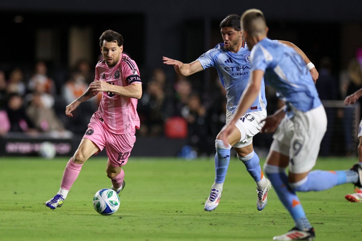 Feb 22, 2025; Fort Lauderdale, Florida, USA; Inter Miami CF forward Lionel Messi (10) kicks the ball against New York City FC during the first half at Chase Stadium. Mandatory Credit: Nathan Ray Seebeck-Imagn Images