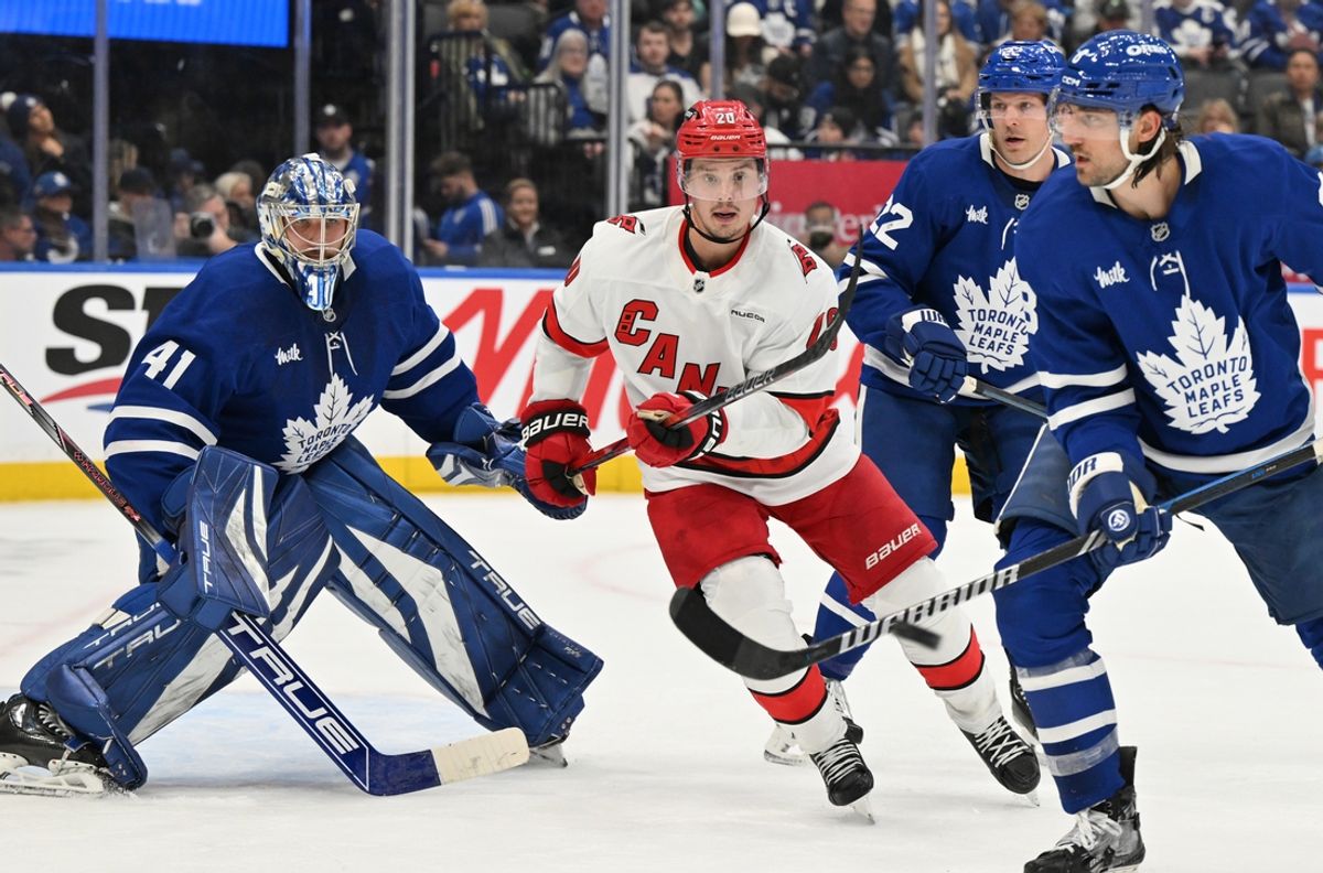 Feb 22, 2025; Toronto, Ontario, CAN;  Carolina Hurricanes forward Sebastian Aho (20) cuts in front of Toronto Maple Leafs goalie Anthony Stolarz (41) in the second period at Scotiabank Arena. Mandatory Credit: Dan Hamilton-Imagn Images