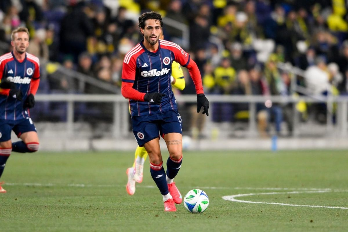 Feb 22, 2025; Nashville, Tennessee, USA;  midfielder Matt Polster (8) dribbles the ball against the Nashville SC during the first half at Geodis Park. Mandatory Credit: Steve Roberts-Imagn Images