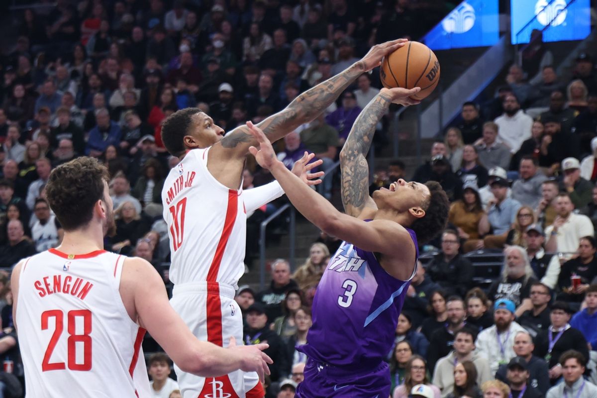Feb 22, 2025; Salt Lake City, Utah, USA; Houston Rockets forward Jabari Smith Jr. (10) defends a shot by Utah Jazz guard Keyonte George (3) during the first half at Delta Center. Mandatory Credit: Rob Gray-Imagn Images