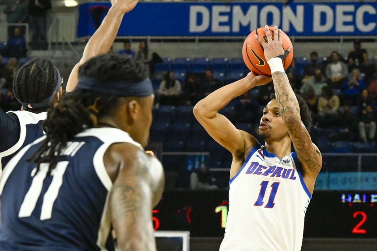 Feb 22, 2025; Chicago, Illinois, USA;  DePaul Blue Demons guard CJ Gunn (11) shoots the ball against the Butler Bulldogs during the second half at Wintrust Arena. Mandatory Credit: Matt Marton-Imagn Images