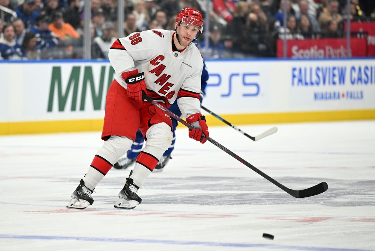 Feb 22, 2025; Toronto, Ontario, CAN;  Carolina Hurricanes forward Mikko Rantanen (96) receives a pass in the third  period against the Toronto Maple Leafs at Scotiabank Arena. Mandatory Credit: Dan Hamilton-Imagn Images