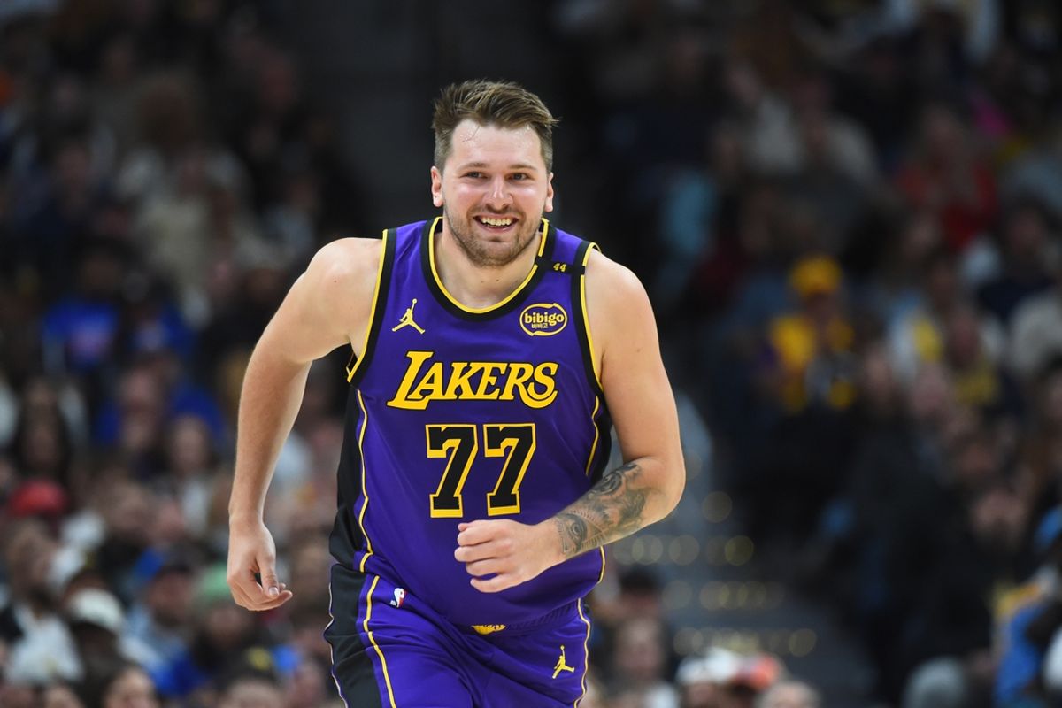 Feb 22, 2025; Denver, Colorado, USA; Los Angeles Lakers guard Luka Doncic (77) after a basket during the first half against the Denver Nuggets at Ball Arena. Mandatory Credit: Christopher Hanewinckel-Imagn Images