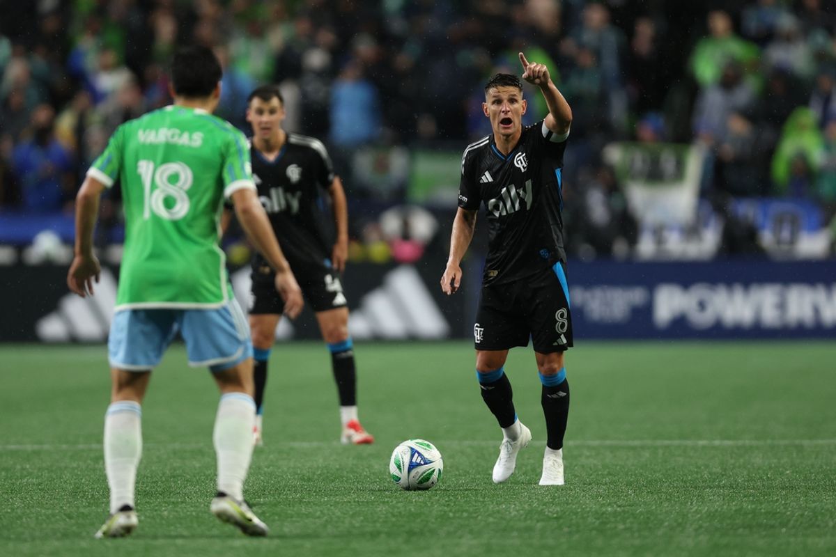 Feb 22, 2025; Seattle, Washington, USA; Charlotte FC midfielder Ashley Westwood (8) controls the ball against Seattle Sounders FC midfielder Obed Vargas (18) in the second half at Lumen Field. Mandatory Credit: Kevin Ng-Imagn Images