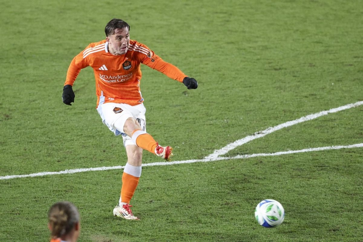 Feb 22, 2025; Houston, Texas, USA; Houston Dynamo FC forward Gabe Segal (17) kicks the ball during the second half against FC Dallas at Shell Energy Stadium. Mandatory Credit: Thomas Shea-Imagn Images
