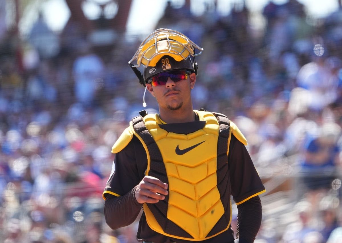 Feb 23, 2025; Phoenix, Arizona, USA; San Diego Padres catcher Ethan Salas (90) looks on against the Los Angeles Dodgers during the second inning at Camelback Ranch-Glendale. Mandatory Credit: Joe Camporeale-Imagn Images