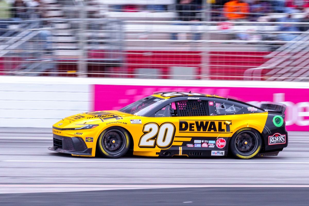 Feb 23, 2025; Hampton, Georgia, USA; Christopher Bell (20) goes into turn one at Atlanta Motor Speedway. Mandatory Credit: Jason Allen-Imagn Images