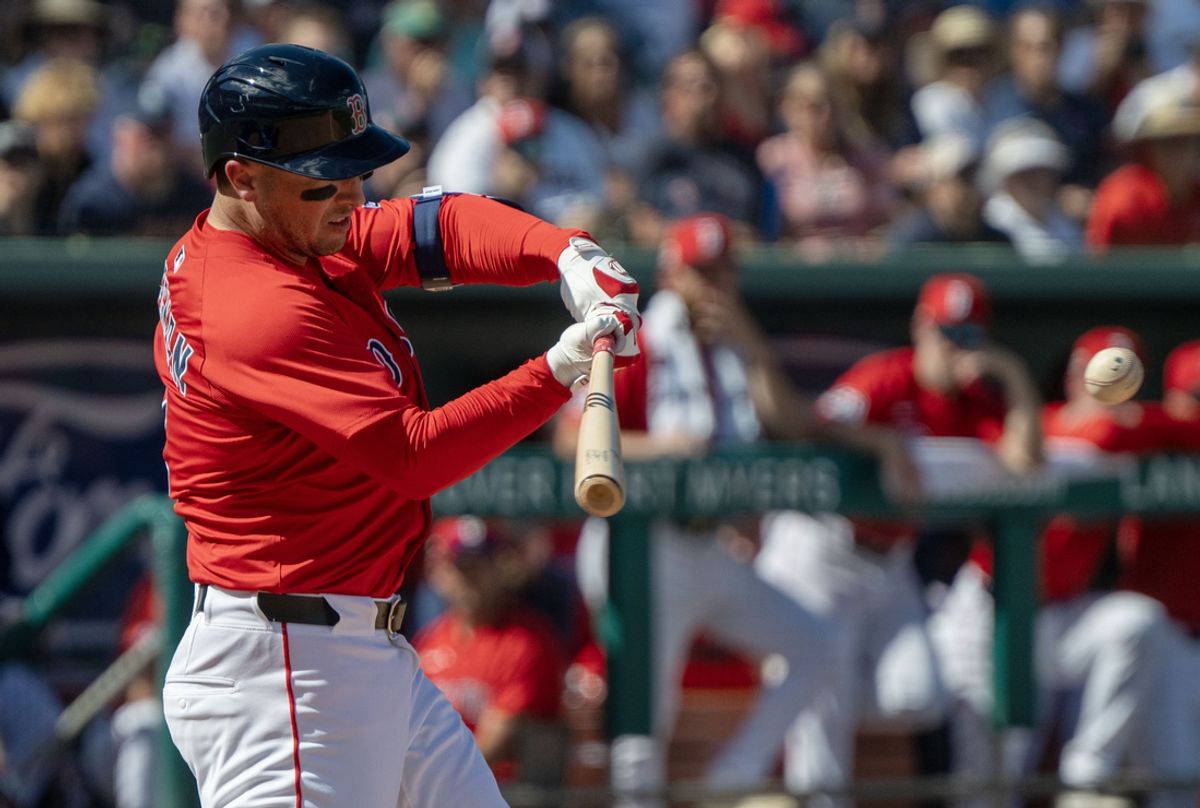 Feb 23, 2025; Fort Myers, Florida, USA; Boston Red Sox infielder Alex Bregman (2) connects with the ball for a double in the fourth inning of their game against the Toronto Blue Jays at JetBlue Park at Fenway South. Mandatory Credit: Chris Tilley-Imagn Images