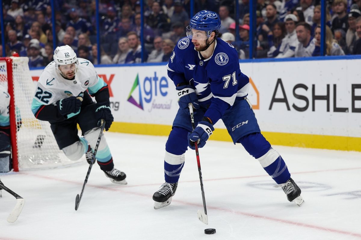 Feb 23, 2025; Tampa, Florida, USA; Tampa Bay Lightning center Anthony Cirelli (71) controls the puck against the Seattle Kraken in the first period at Amalie Arena. Mandatory Credit: Nathan Ray Seebeck-Imagn Images