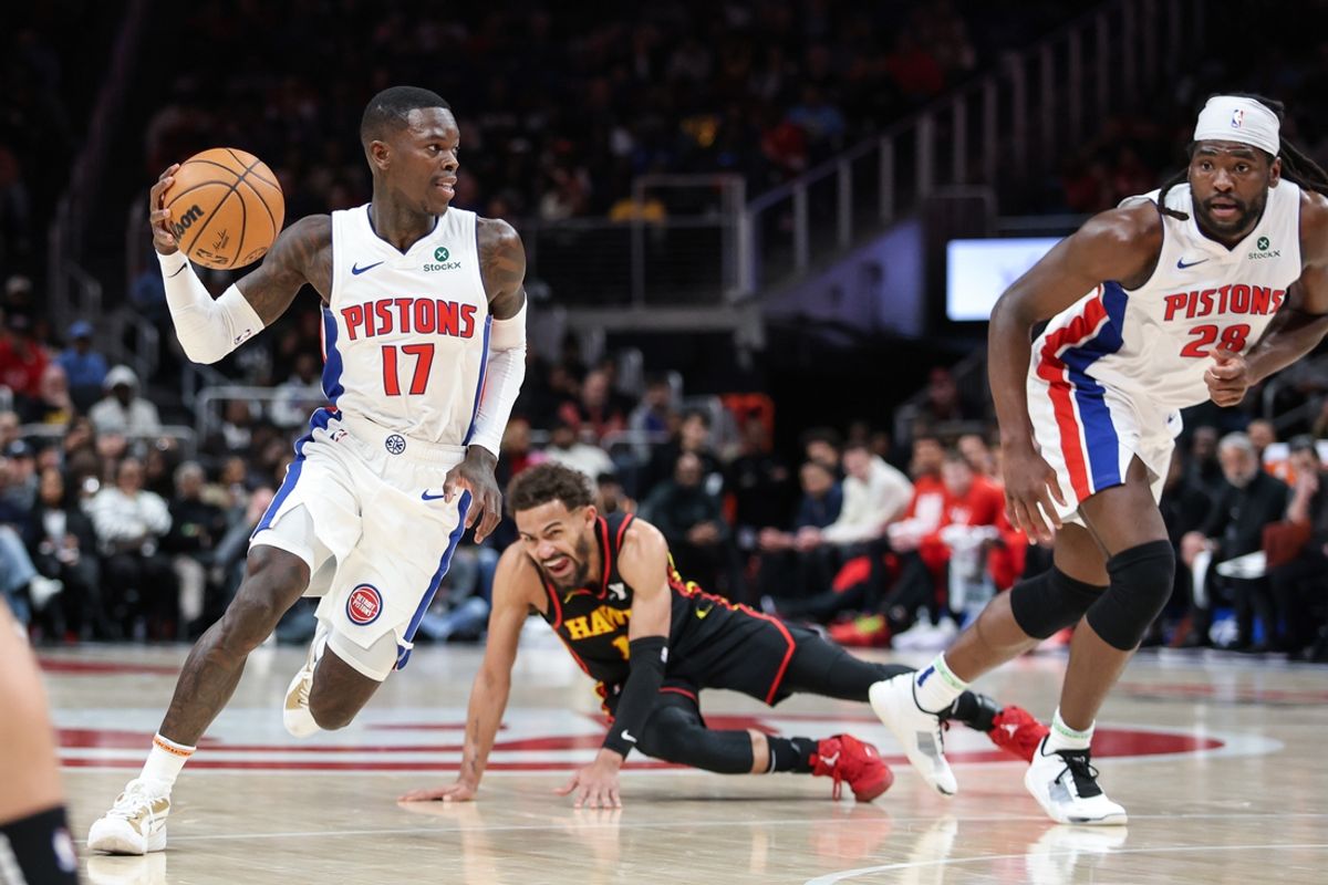 Feb 23, 2025; Atlanta, Georgia, USA; Detroit Pistons guard Dennis Schroder (17) and Detroit Pistons center Isaiah Stewart (28) run offensive screen against Atlanta Hawks guard Trae Young (11) during the first quarter at State Farm Arena. Mandatory Credit: Jordan Godfree-Imagn Images
