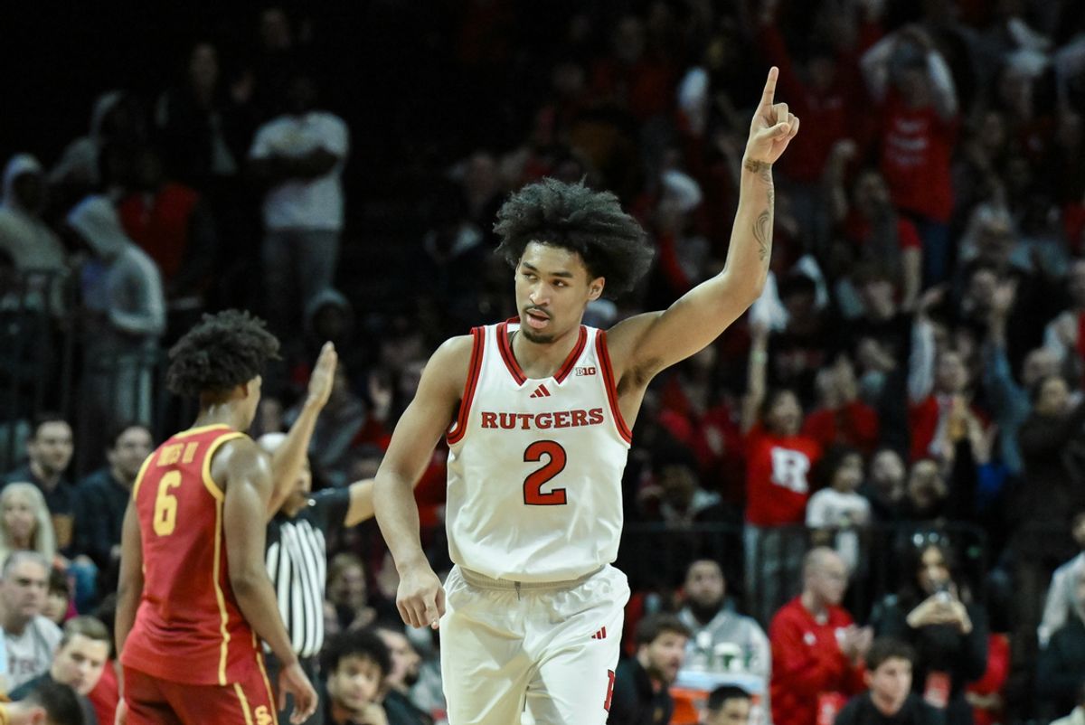 Feb 23, 2025; Piscataway, New Jersey, USA; Rutgers Scarlet Knights guard Dylan Harper (2) reacts during the first half against the USC Trojans at Jersey Mike's Arena. Mandatory Credit: John Jones-Imagn Images