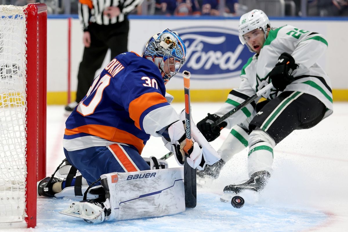 Feb 23, 2025; Elmont, New York, USA; New York Islanders goaltender Ilya Sorokin (30) makes a save against Dallas Stars center Mavrik Bourque (22) during the first period at UBS Arena. Mandatory Credit: Brad Penner-Imagn Images