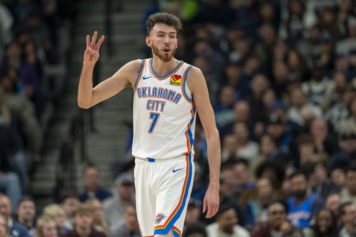 Feb 23, 2025; Minneapolis, Minnesota, USA; Oklahoma City Thunder forward Chet Holmgren (7) holds up three fingers during a free throw against the Minnesota Timberwolves in the first half at Target Center. Mandatory Credit: Jesse Johnson-Imagn Images