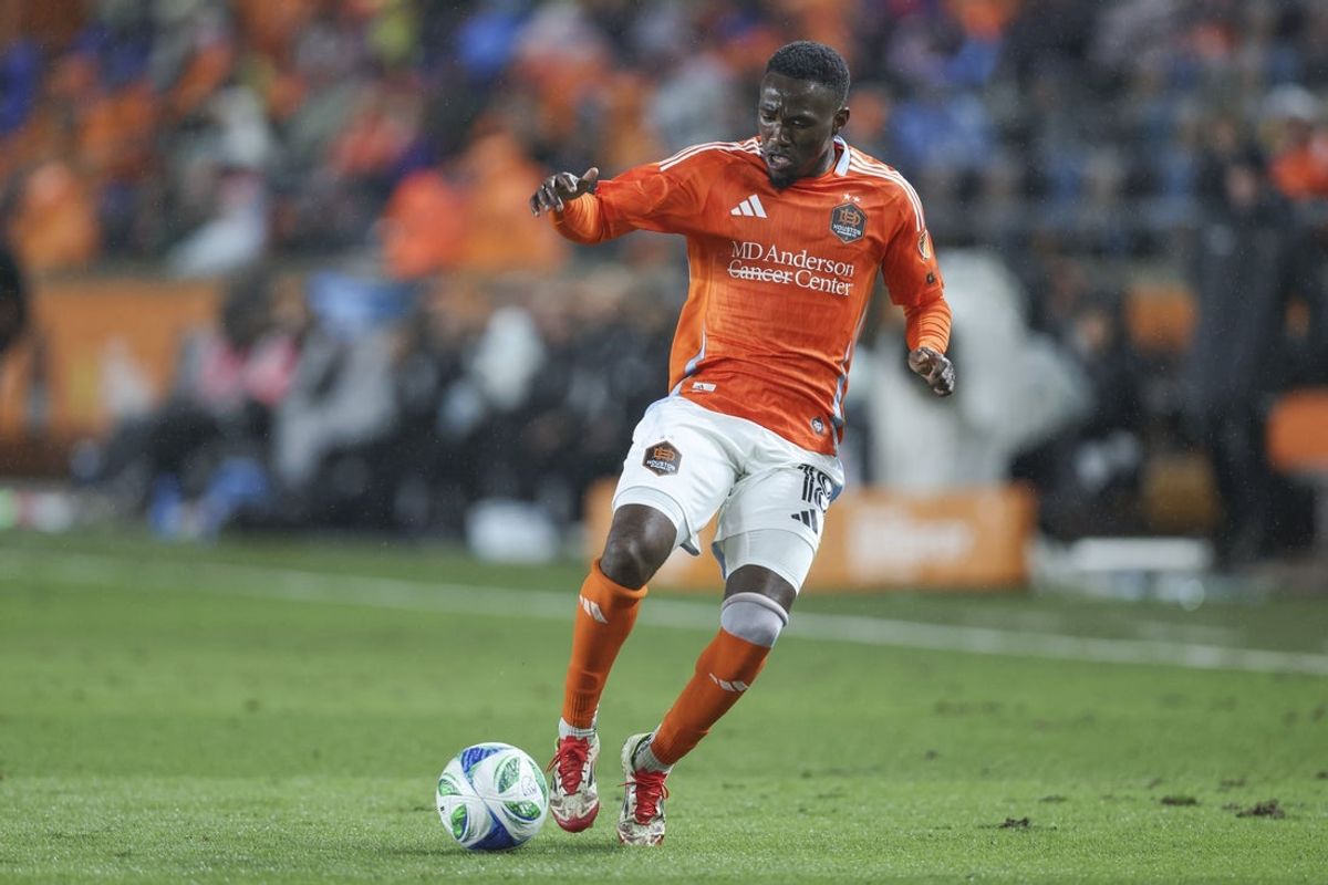 Feb 22, 2025; Houston, Texas, USA; Houston Dynamo FC forward Aliyu Ibrahim (18) in action during the match against FC Dallas at Shell Energy Stadium. Mandatory Credit: Troy Taormina-Imagn Images