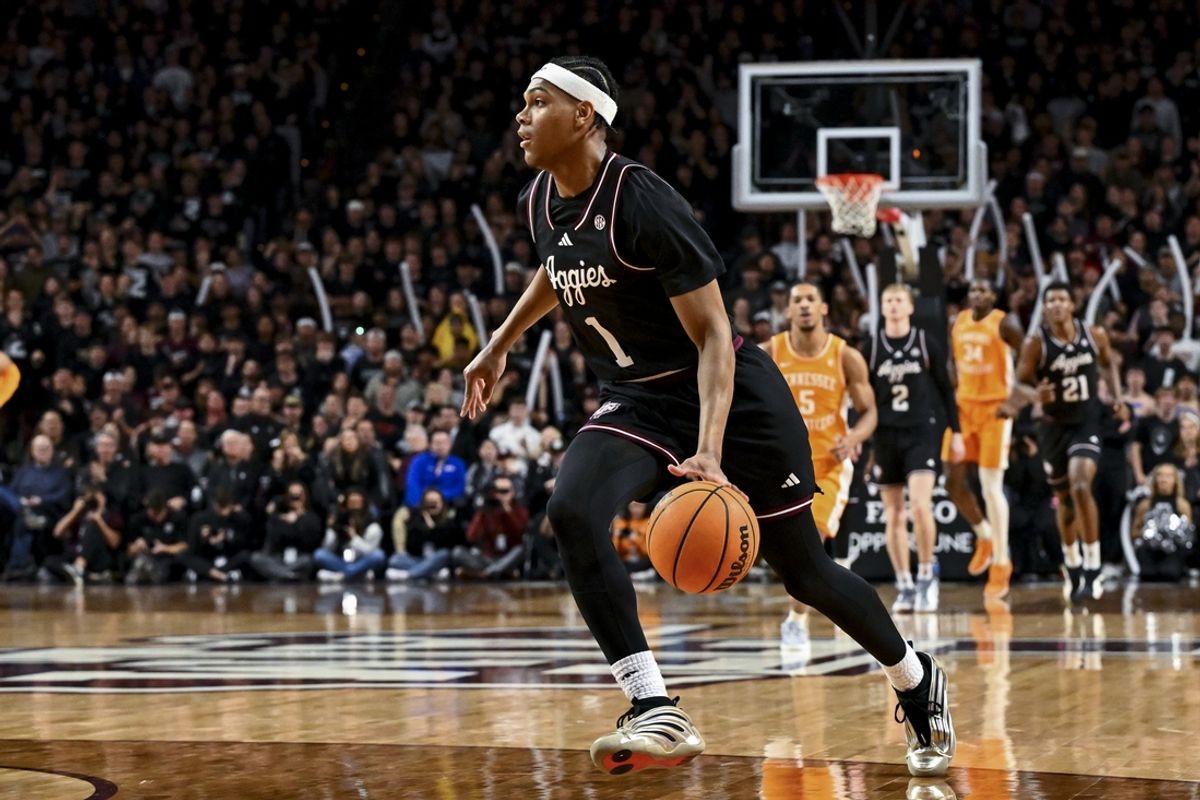 Feb 22, 2025; College Station, Texas, USA; Texas A&M Aggies guard Zhuric Phelps (1) goes to the basket during the first half against the Tennessee Volunteers at Reed Arena. Mandatory Credit: Maria Lysaker-Imagn Images