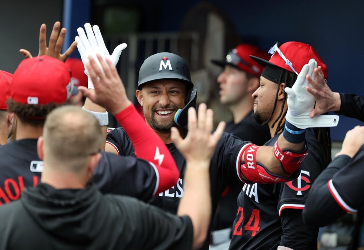 Feb 24, 2025; Port Charlotte, Florida, USA; Minnesota Twins third base Royce Lewis (23) celebrates with teammates after hitting a home run against the Tampa Bay Rays during the second inning at Charlotte Sports Park. Mandatory Credit: Kim Klement Neitzel-Imagn Images