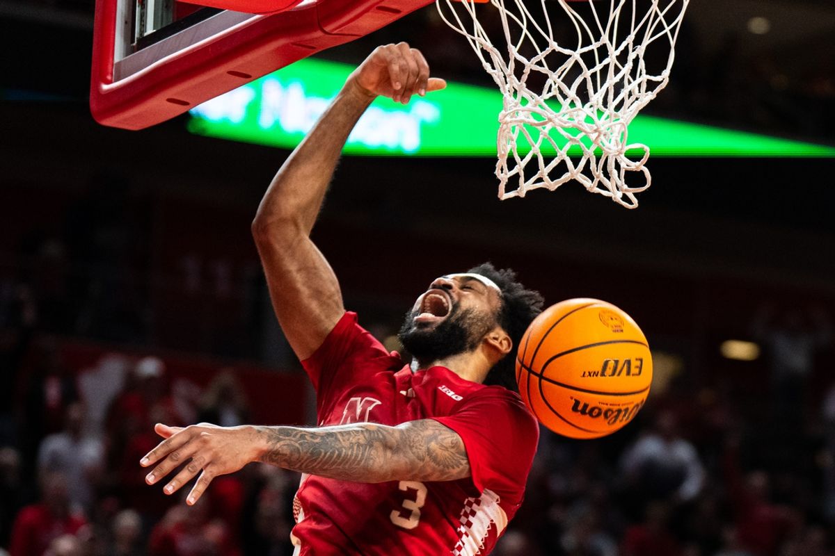 Feb 24, 2025; Lincoln, Nebraska, USA; Nebraska Cornhuskers guard Brice Williams (3) dunks the ball during the first half against the Michigan Wolverines at Pinnacle Bank Arena. Mandatory Credit: Dylan Widger-Imagn Images