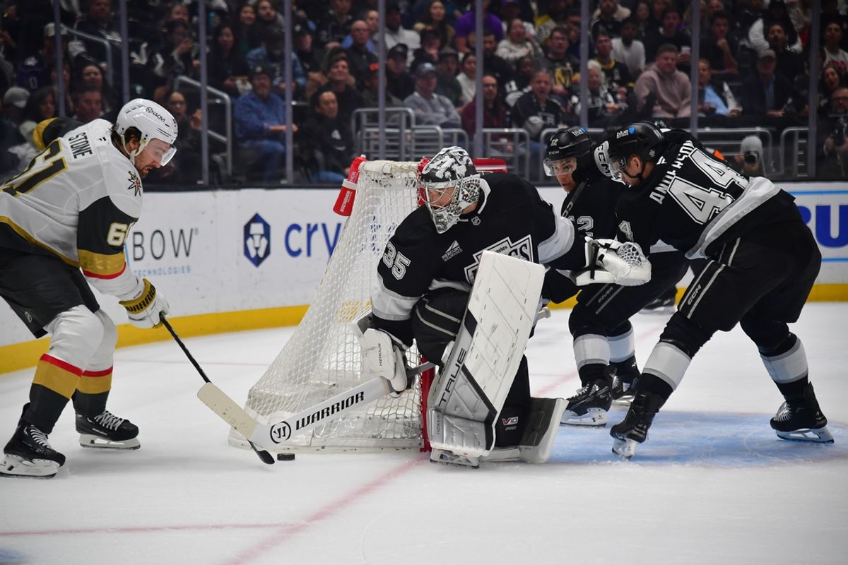 Feb 24, 2025; Los Angeles, California, USA; Los Angeles Kings goaltender Darcy Kuemper (35) defends the goal against Vegas Golden Knights right wing Mark Stone (61) during the first period at Crypto.com Arena. Mandatory Credit: Gary A. Vasquez-Imagn Images