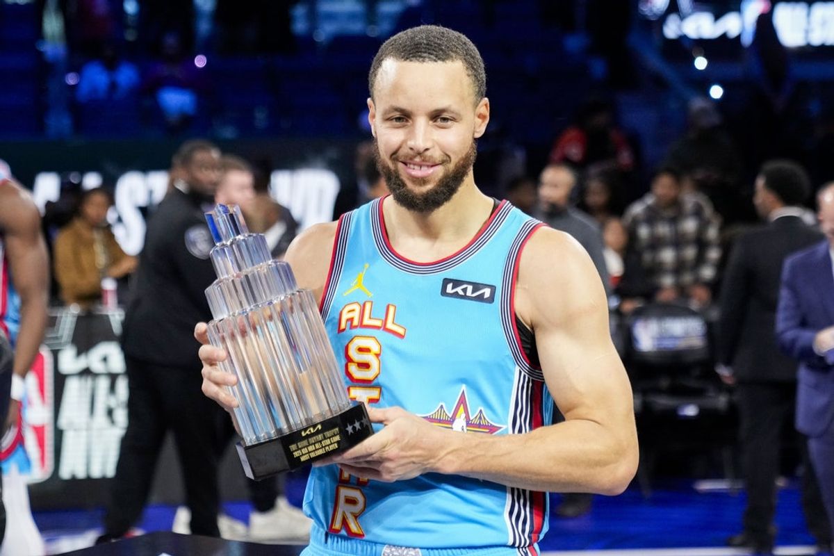 February 16, 2025; San Francisco, CA, USA; Shaq’s OGs guard Stephen Curry (30) of the Golden State Warriors celebrates with the MVP trophy after defeating Chuck’s Global Stars during the 2025 NBA All Star Game at Chase Center. Mandatory Credit: Kyle Terada-Imagn Images