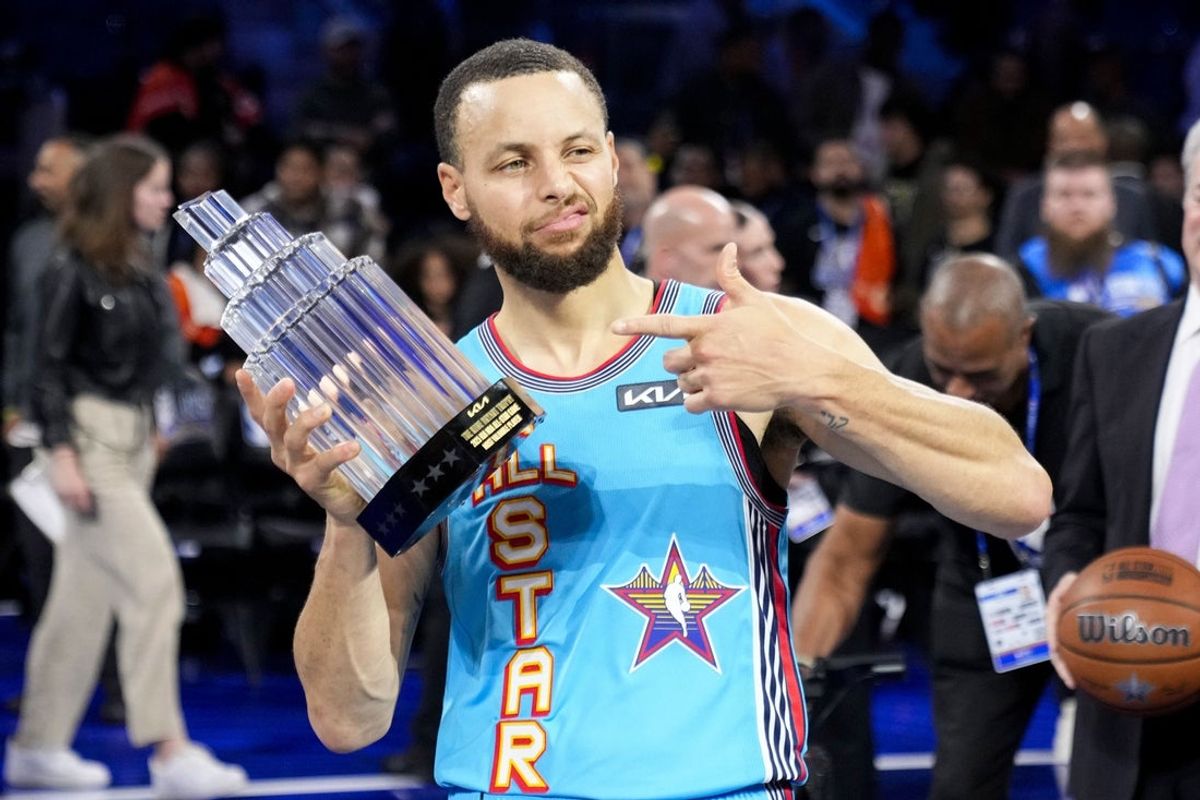 February 16, 2025; San Francisco, CA, USA; Shaq’s OGs guard Stephen Curry (30) of the Golden State Warriors celebrates with the MVP trophy after defeating Chuck’s Global Stars during the 2025 NBA All Star Game at Chase Center. Mandatory Credit: Kyle Terada-Imagn Images