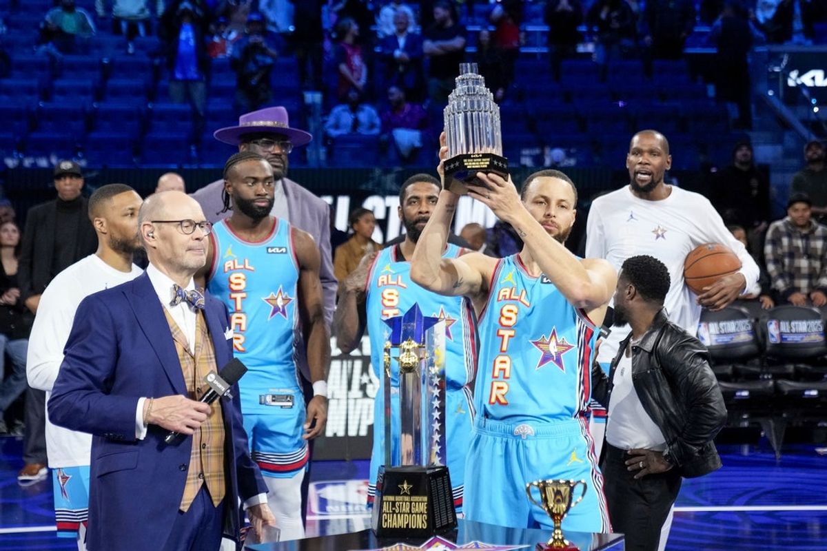 February 16, 2025; San Francisco, CA, USA; Shaq’s OGs guard Stephen Curry (30) of the Golden State Warriors celebrates with the MVP trophy after defeating Chuck’s Global Stars during the 2025 NBA All Star Game at Chase Center. Mandatory Credit: Kyle Terada-Imagn Images