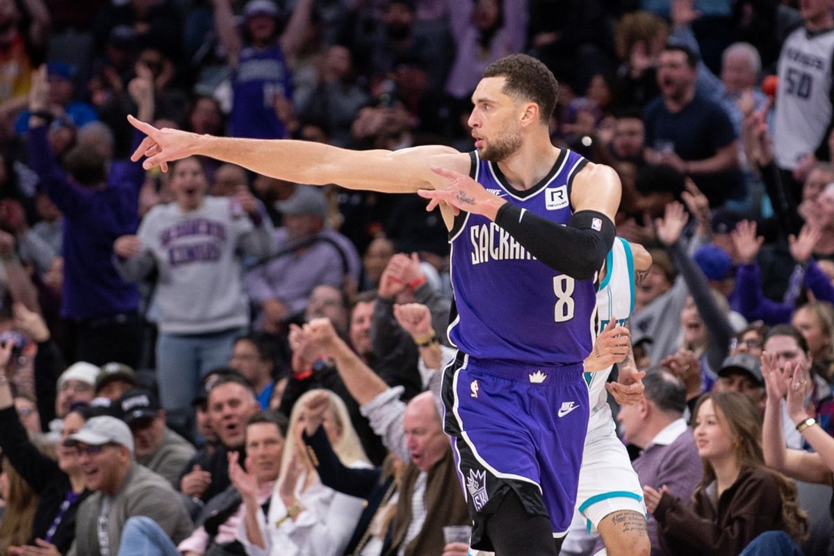 Feb 24, 2025; Sacramento, California, USA; Sacramento Kings guard Zach LaVine (8) reacts after scoring against the Charlotte Hornets during the fourth quarter at Golden 1 Center. Mandatory Credit: Ed Szczepanski-Imagn Images