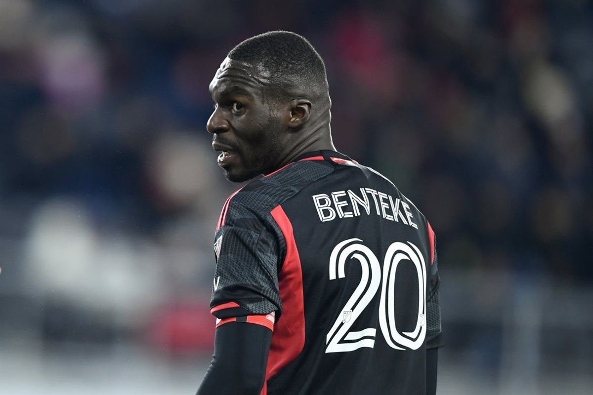 Feb 22, 2025; Washington, District of Columbia, USA; D.C. United forward Christian Benteke (20) reacts to receiving a yellow card during the second half against the Toronto FC at Audi Field. Mandatory Credit: Hannah Foslien-Imagn Images