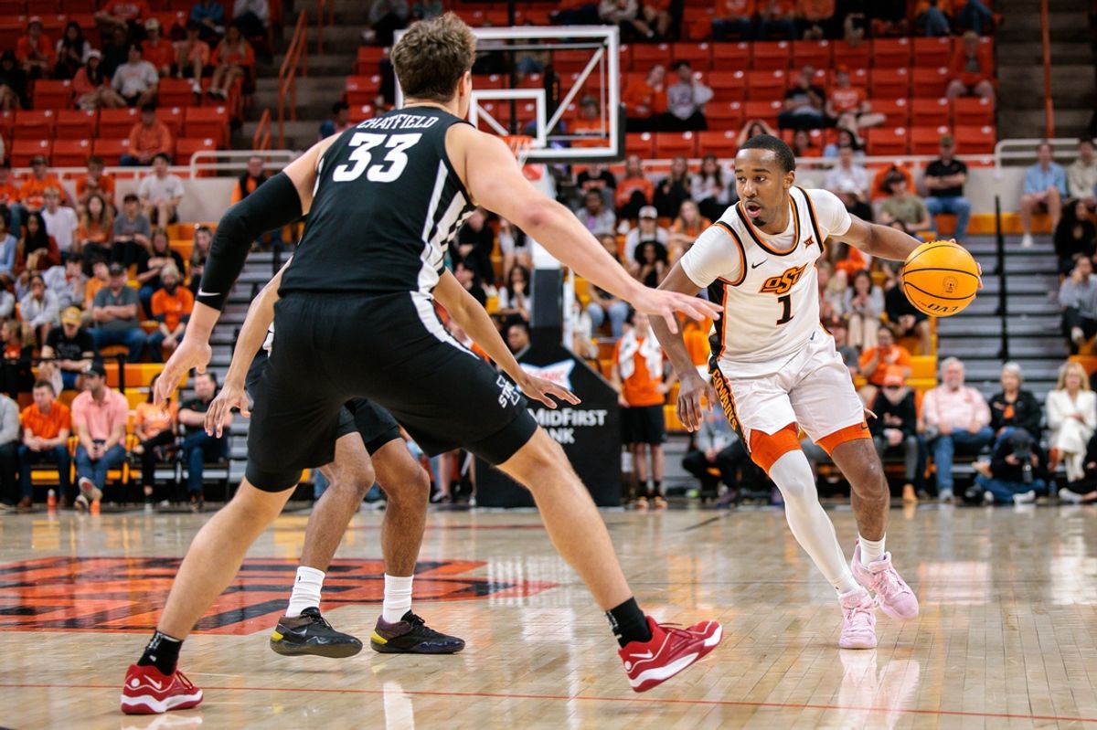 Feb 25, 2025; Stillwater, Oklahoma, USA; Oklahoma State Cowboys guard Bryce Thompson (1) brings the ball up court during the first half against the Iowa State Cyclones at Gallagher-Iba Arena. Mandatory Credit: William Purnell-Imagn Images