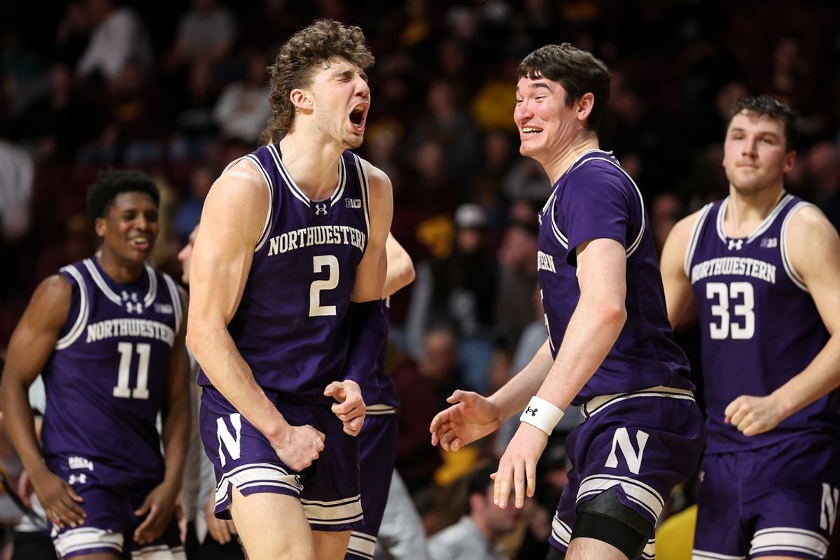Feb 25, 2025; Minneapolis, Minnesota, USA; Northwestern Wildcats forward Nick Martinelli (2) celebrates his team's win against the Minnesota Golden Gophers after the game at Williams Arena. Mandatory Credit: Matt Krohn-Imagn Images