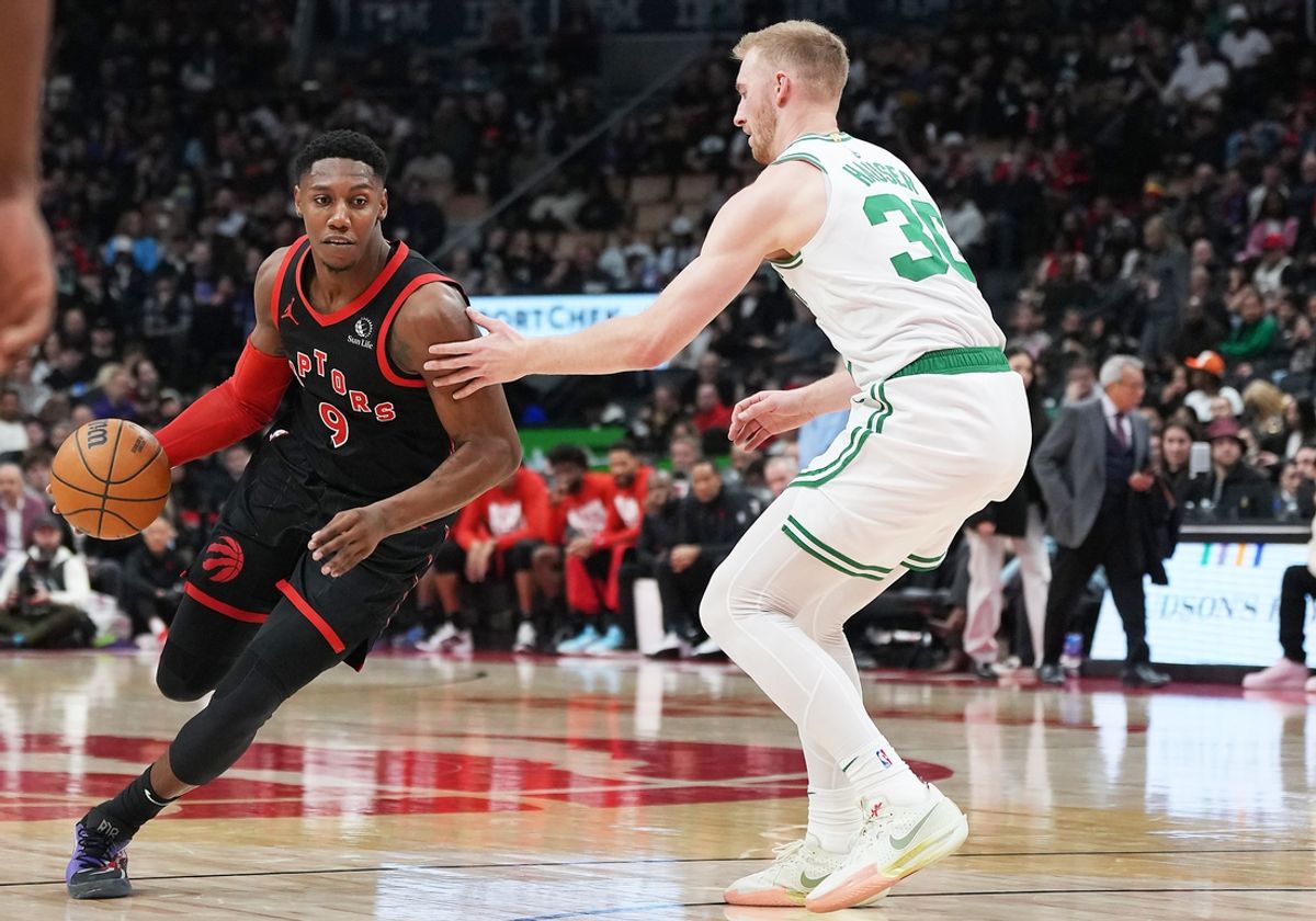 Feb 25, 2025; Toronto, Ontario, CAN; Toronto Raptors guard RJ Barrett (9) controls the ball as Boston Celtics forward Sam Hauser (30) tries to defend during the third quarter at the Scotiabank Arena. Mandatory Credit: Nick Turchiaro-Imagn Images