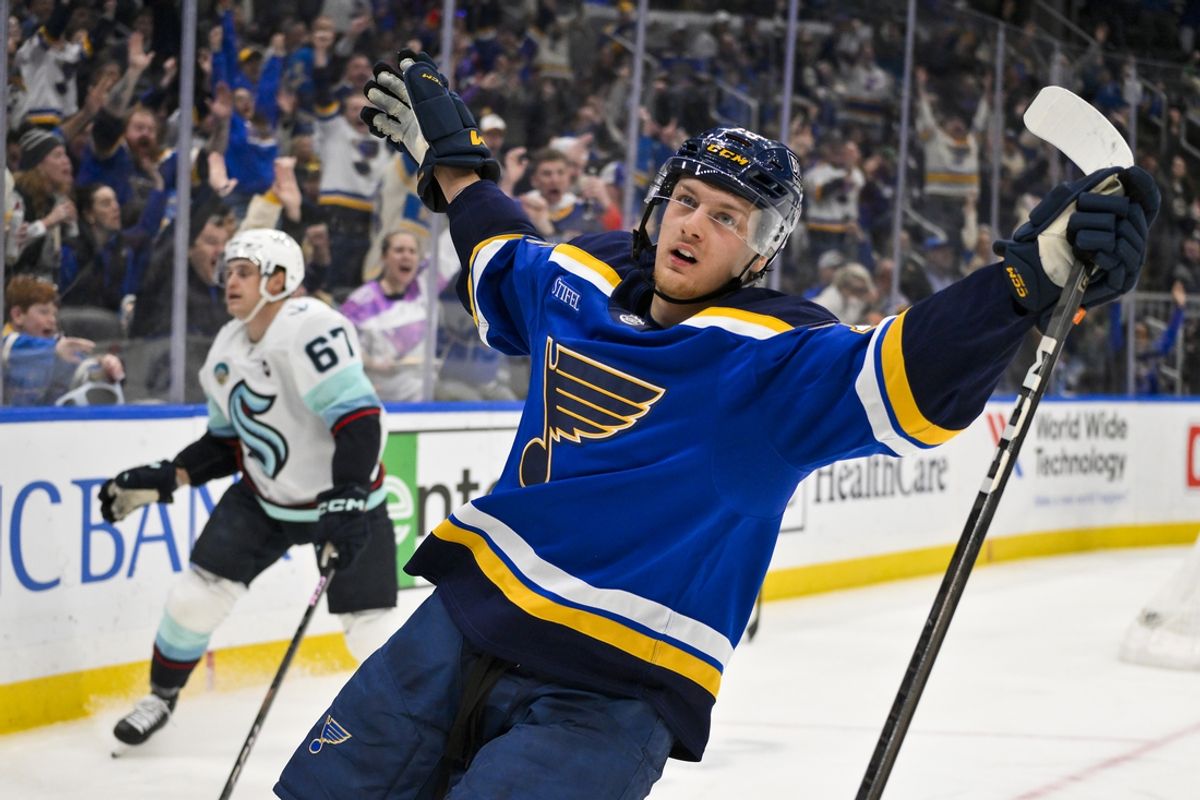 Feb 25, 2025; St. Louis, Missouri, USA;  St. Louis Blues center Zack Bolduc (76) reacts after scoring against the Seattle Kraken during the second period at Enterprise Center. Mandatory Credit: Jeff Curry-Imagn Images