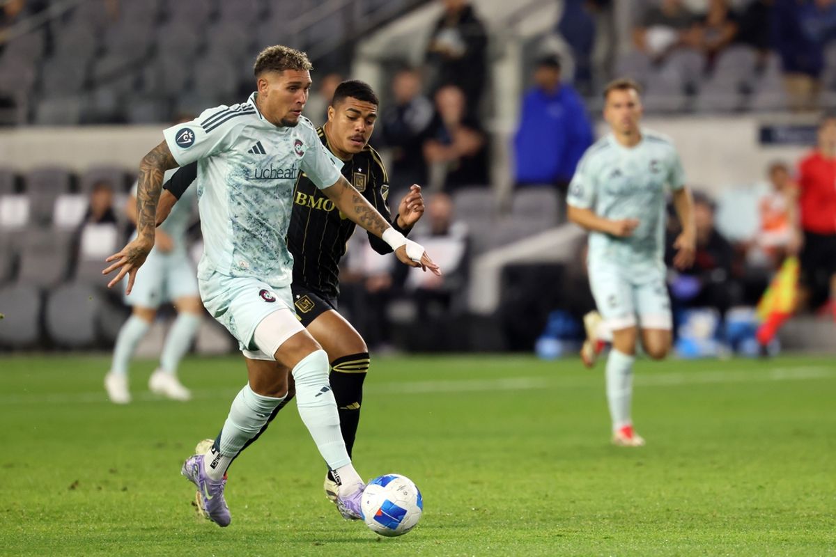 Feb 25, 2025; Los Angeles, California, USA;  Colorado Rapids forward Rafael Navarro (9) dribbles the ball against LAFC midfielder Igor Jesus (6) during the first half of Concacaf Champions Cup Round 1 match at BMO Stadium. Mandatory Credit: Kiyoshi Mio-Imagn Images