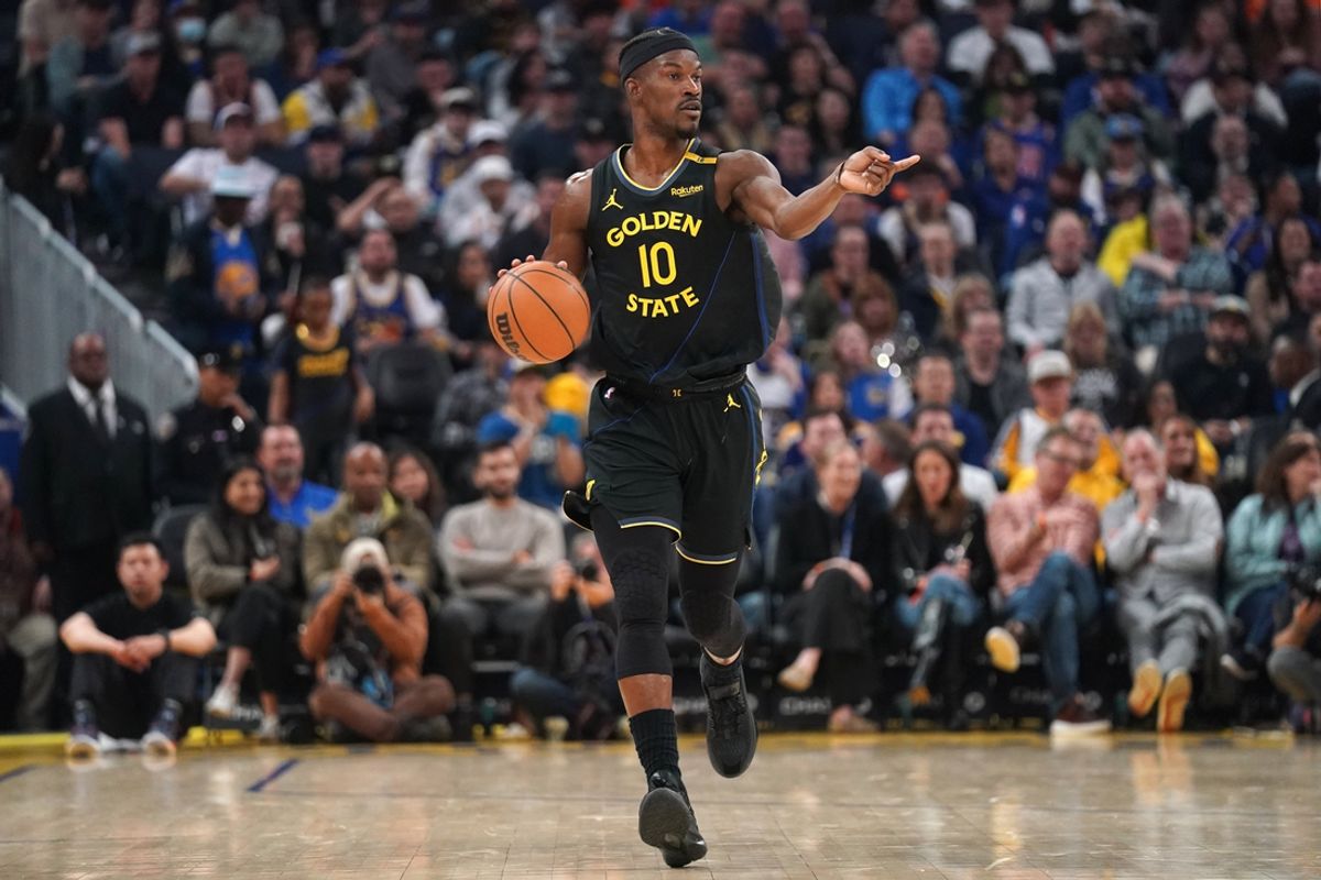 Feb 25, 2025; San Francisco, California, USA; Golden State Warriors forward Jimmy Butler III (10) dribbles against the Charlotte Hornets in the second quarter at the Chase Center. Mandatory Credit: Cary Edmondson-Imagn Images
