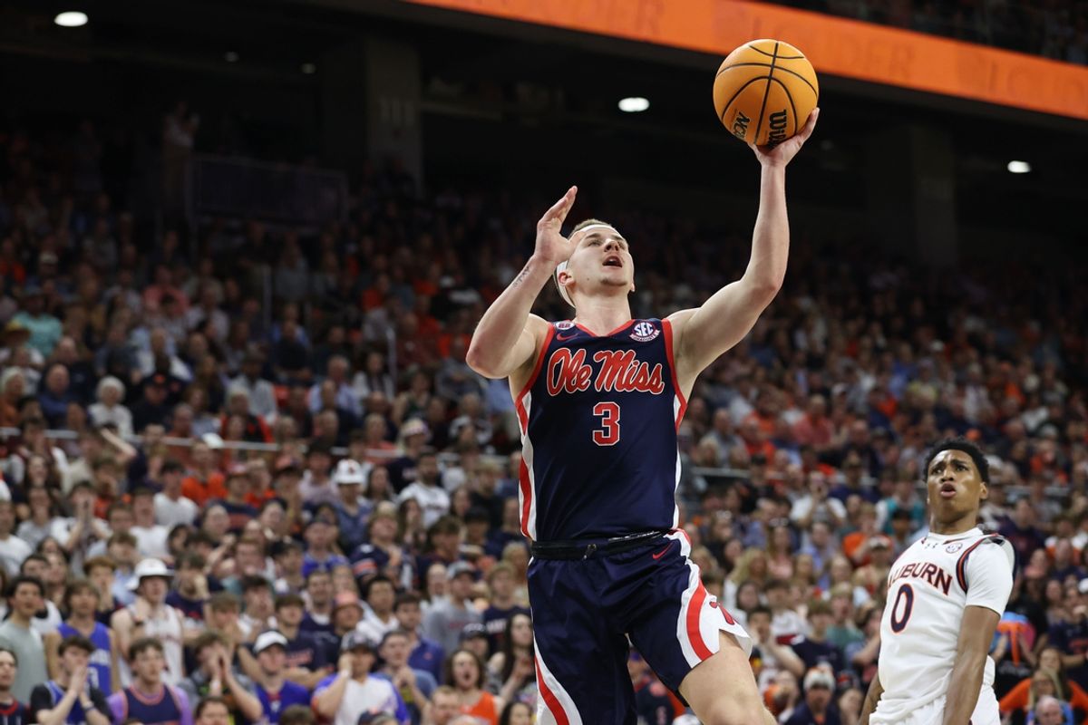 Feb 26, 2025; Auburn, Alabama, USA;  Mississippi Rebels guard Sean Pedulla (3) goes for a layup during the first half against the Auburn Tigers at Neville Arena. Mandatory Credit: John Reed-Imagn Images