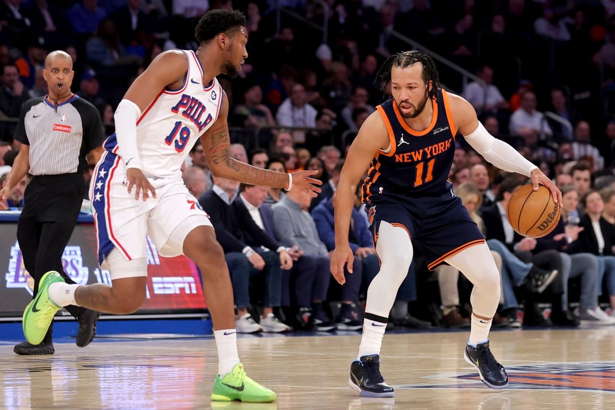 Feb 26, 2025; New York, New York, USA; New York Knicks guard Jalen Brunson (11) controls the ball against Philadelphia 76ers forward Justin Edwards (19) during the first quarter at Madison Square Garden. Mandatory Credit: Brad Penner-Imagn Images