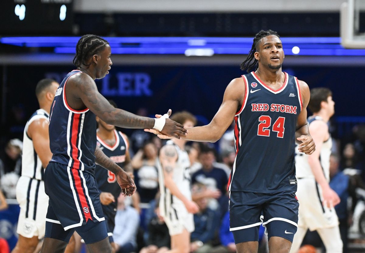 Feb 26, 2025; Indianapolis, Indiana, USA; St. John's Red Storm guard Kadary Richmond (1) high-fives St. John's Red Storm forward Zuby Ejiofor (24) after a play during the first half against the Butler Bulldogs at Hinkle Fieldhouse. Mandatory Credit: Robert Goddin-Imagn Images