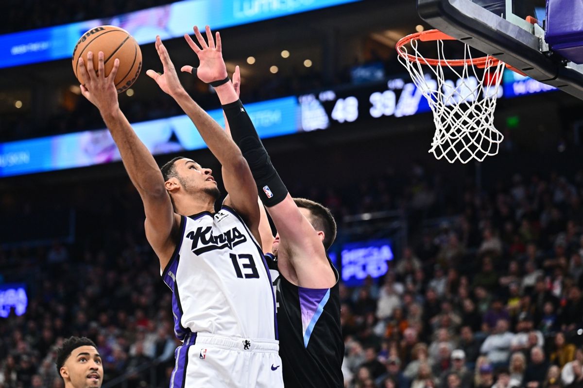 Feb 26, 2025; Salt Lake City, Utah, USA;  /Sacramento Kings forward Keegan Murray (13) attempts a shot in the first half against the Utah Jazz at Delta Center. Mandatory Credit: Jamie Sabau-Imagn Images