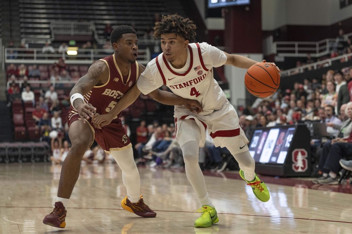 Feb 26, 2025; Stanford, California, USA;  Stanford Cardinal guard Oziyah Sellers (4) drives the ball during the first half against Boston College Eagles guard Fred Payne (5) at Maples Pavilion. Mandatory Credit: Stan Szeto-Imagn Images