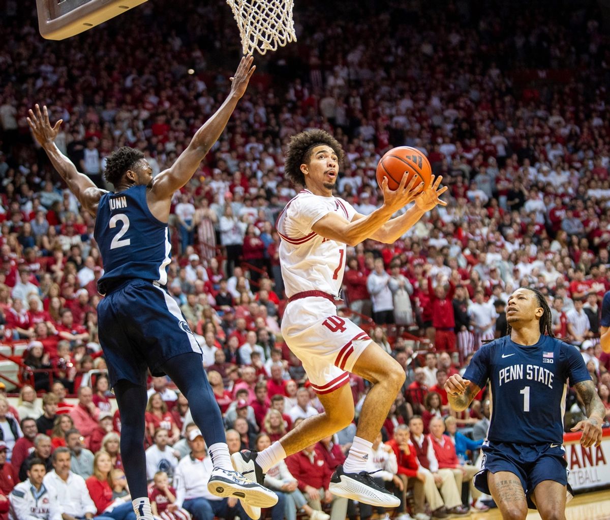 Indiana's Myles Rice (2) shoots past Penn State's D'Marco Dunn (2) during the Indiana versus Penn St. men's basketball game at Simon Skjodt Assembly Hall on Wednesday, Feb. 26, 2025.