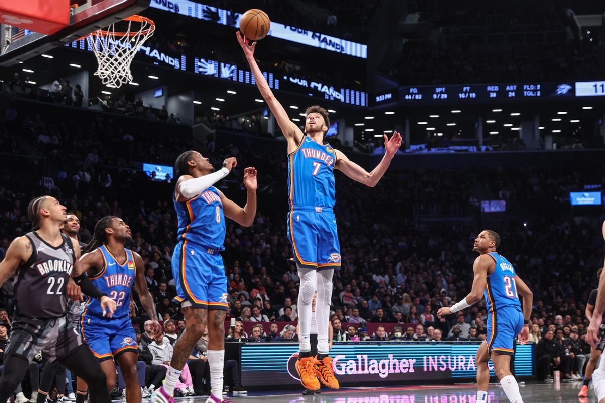 Feb 26, 2025; Brooklyn, New York, USA;  Oklahoma City Thunder forward Chet Holmgren (7) grabs a rebound in the fourth quarter against the Brooklyn Nets at Barclays Center. Mandatory Credit: Wendell Cruz-Imagn Images
